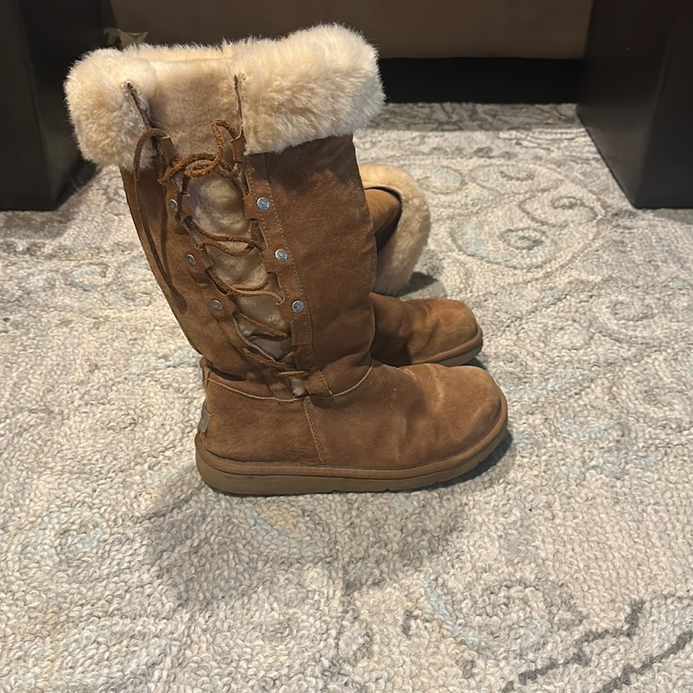 ugg tall furry boots w/ cross cross laces